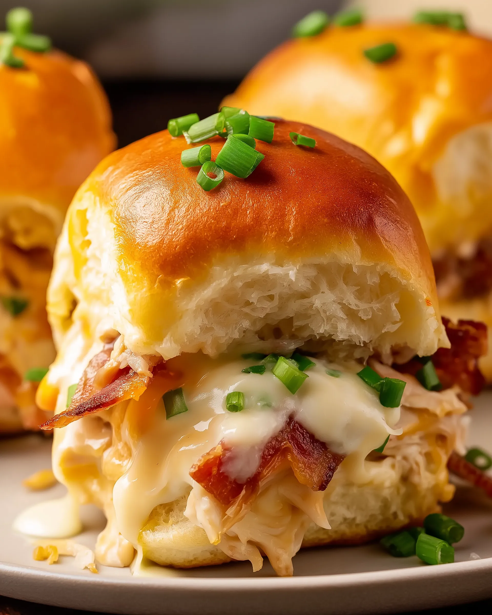 Crack chicken sliders with cheese and bacon.