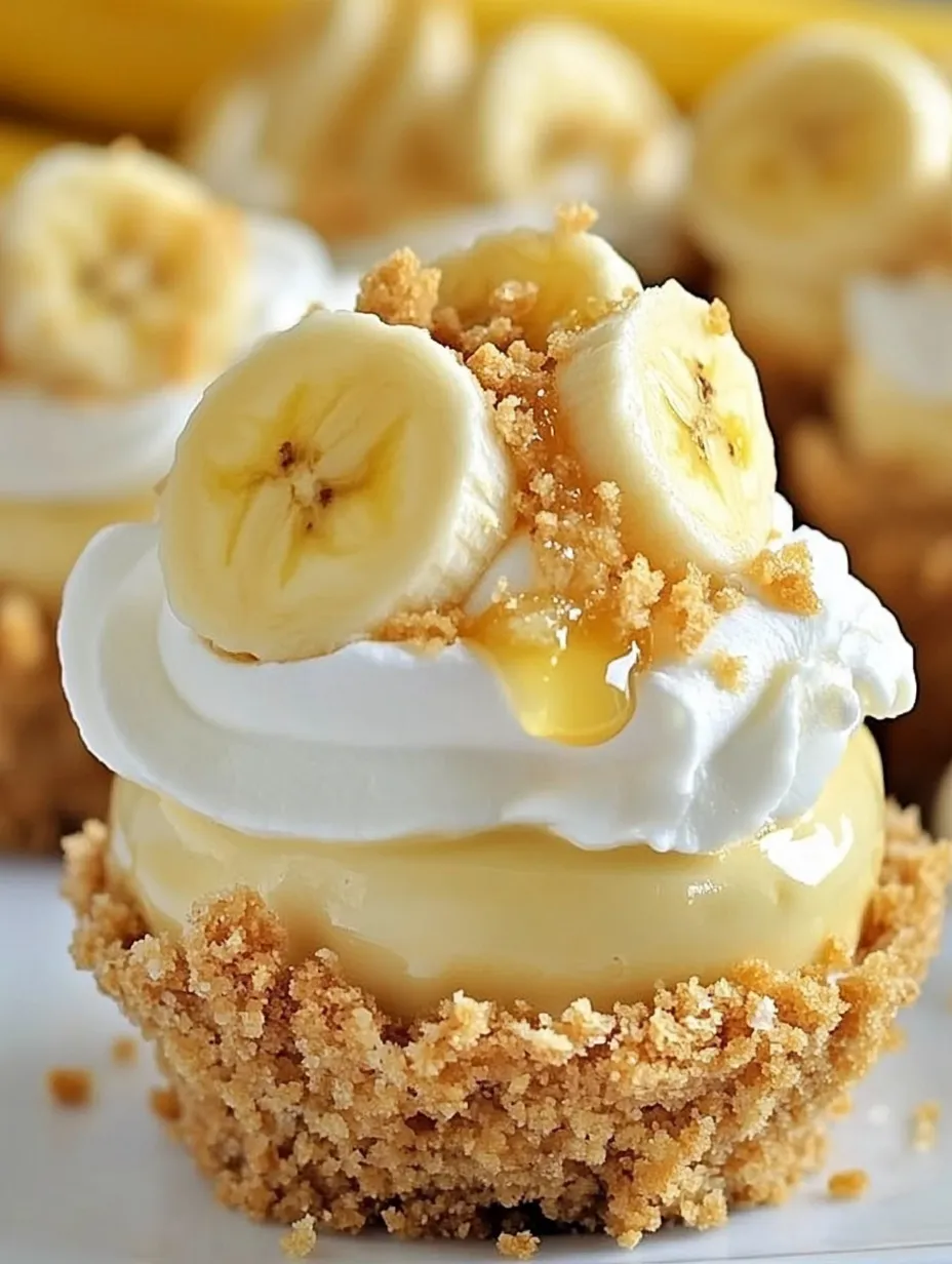 A dessert with bananas and cream.