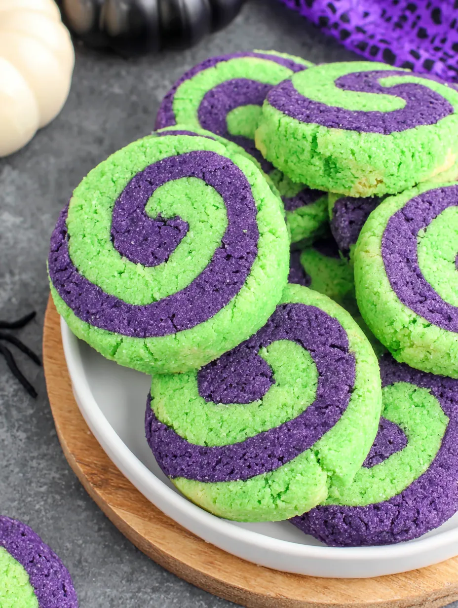 A plate of Halloween pinwheel cookies.