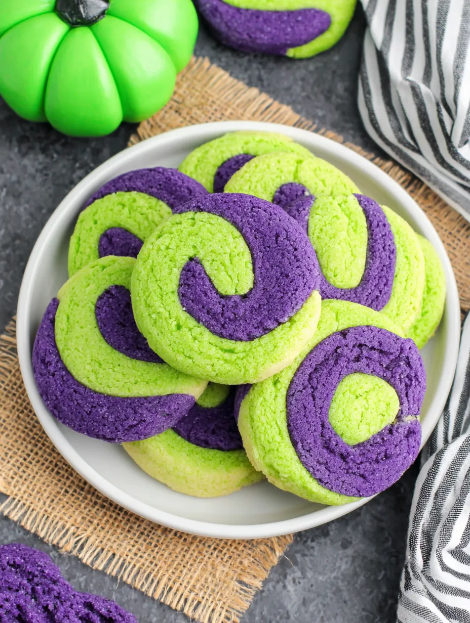 A plate of Halloween pinwheel cookies.