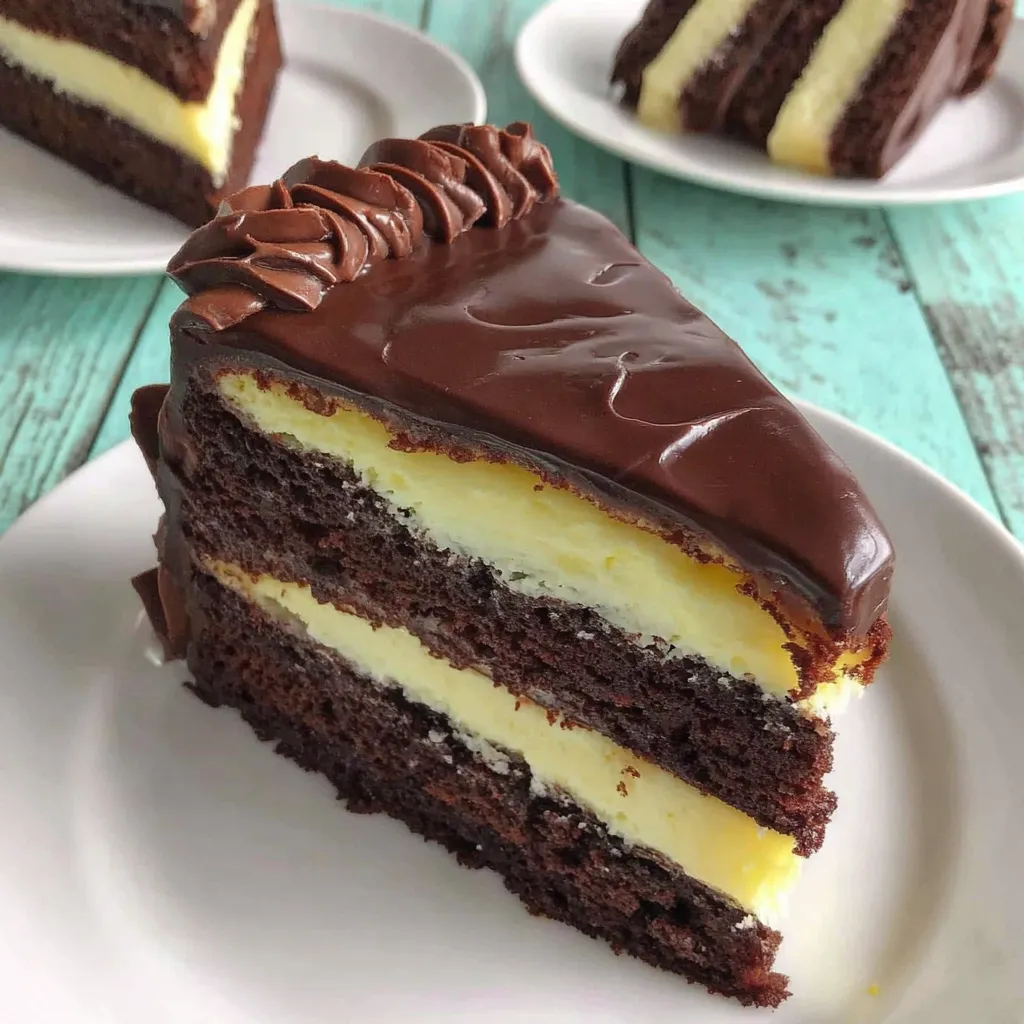 A slice of triple chocolate cheesecake on a plate.