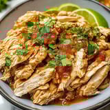Saucy chicken in a bowl, ready to enjoy.