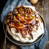 A chocolate pavlova with salted caramel on top.