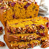 A slice of cranberry pecan pumpkin bread.