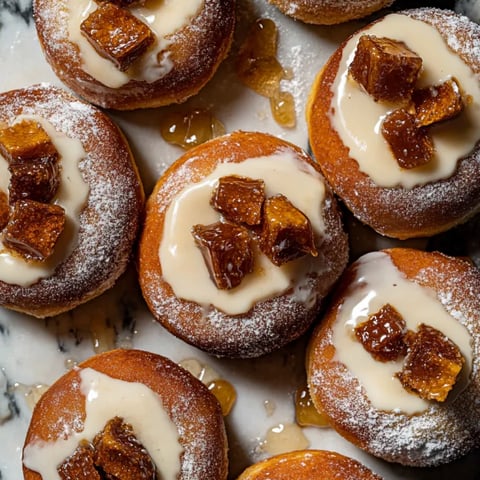 Golden brioche donuts filled with honey cream.